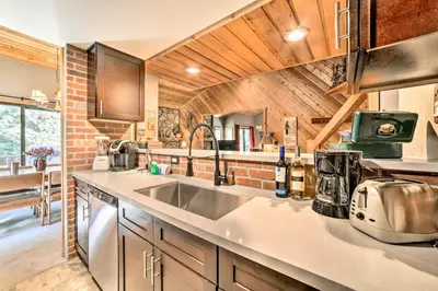 a kitchen with a sink and a counter at Renovated Mammoth Lakes Retreat with Private Balcony in Mammoth Lakes