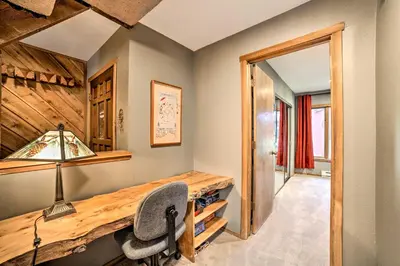a home office with a desk and a chair at Renovated Mammoth Lakes Retreat with Private Balcony in Mammoth Lakes