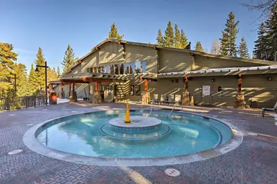 a small fountain in front of a building at Free Ski Shuttle! Spacious Northstar Resort Cabin in Truckee