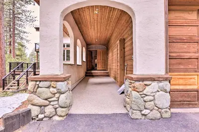 an entrance to a house with a wooden door at Mtn and Lake Views Incline Village Ski Chalet in Incline Village