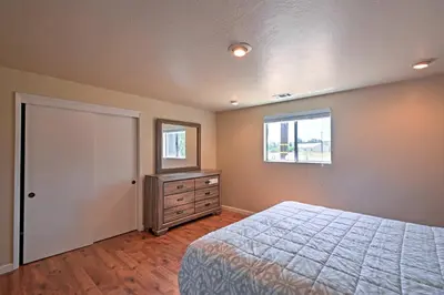 a bedroom with a bed and a window and a dresser at Remodeled and Cozy Gilroy Guest House Near Downtown! in Gilroy