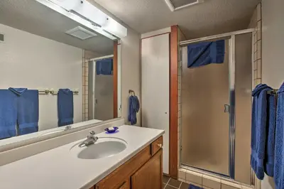 a bathroom with a sink and a shower at 11 Mi to Palisades Tahoe Lakefront Home with View! in Tahoe City