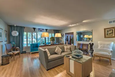 a living room with a couch and a table at Spacious Wine Country Home 1 Mi to Downtown Lodi! in Lodi