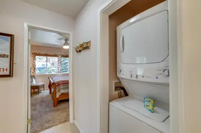 a kitchen with a washer and dryer in a room at Quiet Condo with Great Views, half Mi to Eagle Lodge! in Mammoth Lakes