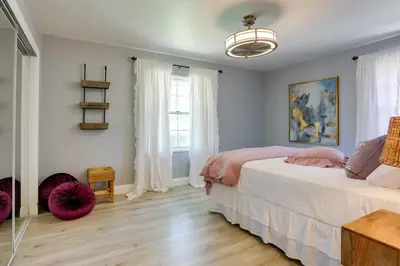 a bedroom with a bed and a window at Family Home with Pool about 7 Mi to Downtown Sacramento! in Sacramento