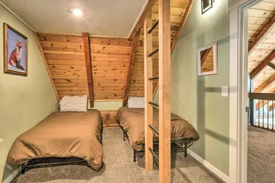 two bunk beds in a room with a staircase at Close to Donner Lake and Skiing Truckee Getaway in Truckee