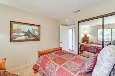 a bedroom with two beds and a window at 1 Mi to Lake Tahoe Home with Hot Tub and Decks in Tahoe City