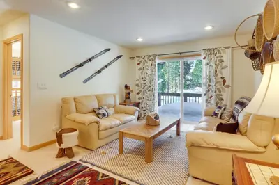a living room with a couch and a table at 7 Mi to Northstar Resort Tahoe Vista Family Cabin in Tahoe Vista