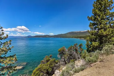 a view of a large body of water with trees at 1 Mi to Skiing and Beaches Incline Village Home! in Incline Village