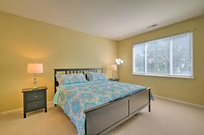 a bedroom with a bed and a window at Family-Friendly Tracy House with Patio and Grill! in Tracy