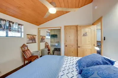 a bedroom with a bed and a ceiling fan at 3 Mi to Heavenly Mountain Resort Home with Deck in Stateline