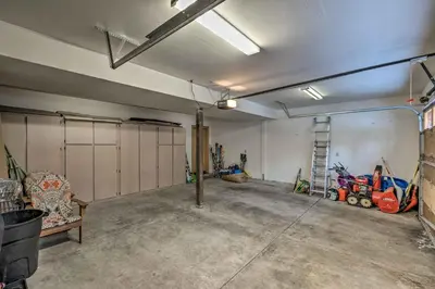 an empty garage with a room with a garage at Tahoe Donner Mountain Cabin Surrounded by Forest! in Truckee