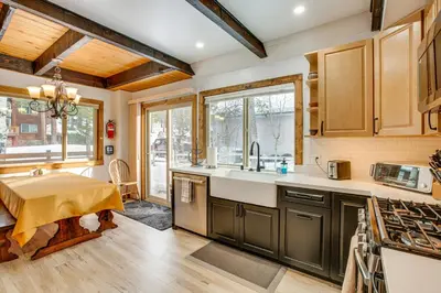a kitchen with a sink and a counter top at 11 Mi to Ski Resorts! Lake Tahoe Gem with Pool Table in South Lake Tahoe