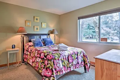 a bedroom with a bed and a window at 1 Mi to Shore Quiet South Lake Tahoe Condo in South Lake Tahoe