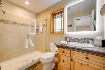 a bathroom with a toilet and a shower and a sink at 4 Mi to Ski Mt Rose Sleek Reno-Lake Tahoe Home in Reno