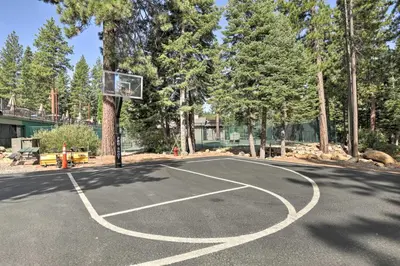 a basketball hoop in the middle of a driveway at 2 Mi to Northstar Resort Idyllic Cabin with Shuttle in Truckee