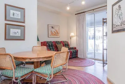 a living room with a table and chairs and a couch at Snowcreek - #510 Phase IV in Mammoth Lakes