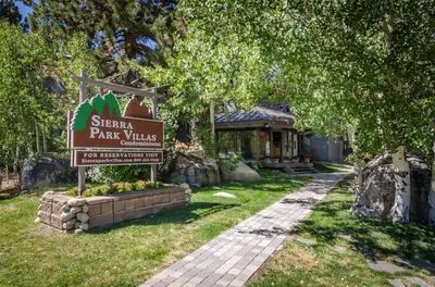 a sign for a park in front of a house at Sierra Park Villas N-#66 in Mammoth Lakes