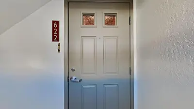 a white door with a window on top of it at Spectacular 3 Bedroom Townhome with Pool in Mammoth Lakes