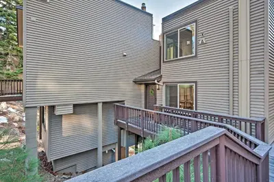 a house with a wooden balcony next to a house at 2 Mi to Heavenly Mountain Tahoe Retreat with Views in Stateline