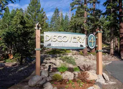 a sign for a disney entrance to a resort at The Mammoth House in Mammoth Lakes