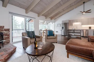 a living room with a couch and a table at Chateau Blanc 11 in Mammoth Lakes