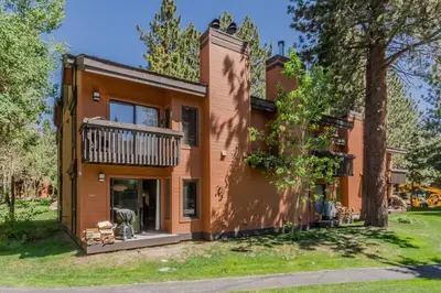 a house with a balcony on the side of it at Snowcreek I 33 in Mammoth Lakes