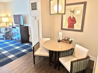 a small room with a table and chairs in a room at Marriott Grand Res Q3 #2241 in South Lake Tahoe