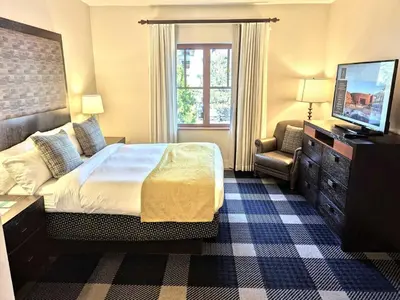 a hotel room with a bed and a television at Marriott Grand Res Q1 #3256 in South Lake Tahoe