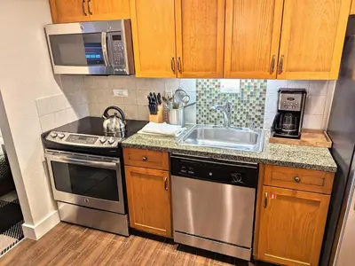 a kitchen with a sink and a stove at Marriott Grand Res Q2 #3167 in South Lake Tahoe