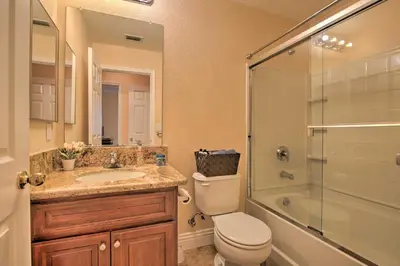 a bathroom with a toilet and a sink and a shower at Sacramento Area Apartment 15 Mi to Downtown in Antelope