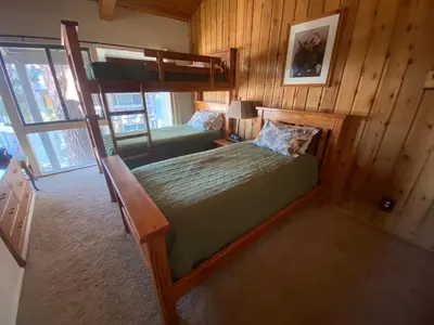 a bedroom with a bunk bed in a room at Sierra Park Villas 23 in Mammoth Lakes