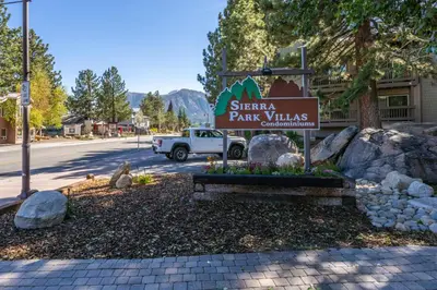 a sign for the entrance to a park villas at Sierra Park Villas 04 in Mammoth Lakes