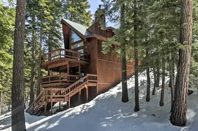 a tree house in the woods in the snow at Tahoe Donner Retreat with Decks and Lake Access! in Truckee