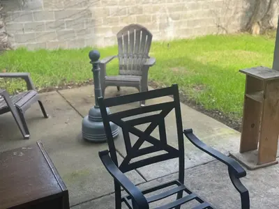 a couple of chairs sitting on a patio at WHOLE Family - Rosemont in Sacramento