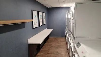 a hallway with a bench in a hospital room at Staybridge Suites - Carson City - Tahoe Area by IHG in Carson City
