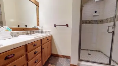 a bathroom with a sink and a shower at Snowcreek The Lodges #1130 condo in Mammoth Lakes