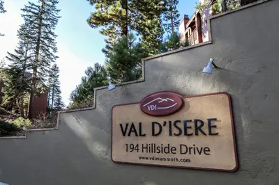 a sign for a vial disservice sign on a wall at Val D'Isere #17 condo in Mammoth Lakes