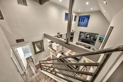 an overhead view of a staircase in a house at LUXE 4 Blue Diamond Lake Tahoe Lodge in Stateline