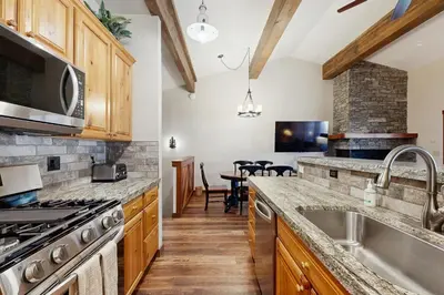 a kitchen with a sink and a stove at Private Beach Retreat in Zephyr Cove