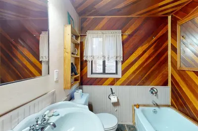a bathroom with a sink and a toilet and a tub at Tahoe Delight in Tahoe City