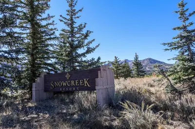 a sign at the top of a mountain at Snowcreek #760 condo in Mammoth Lakes