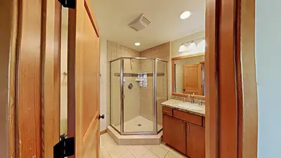 a bathroom with a shower and a sink at Beautifully Remodeled 4 Bedroom Home in Mammoth Lakes