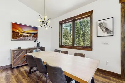 a dining room with a table and chairs at Truckee Treat in Truckee