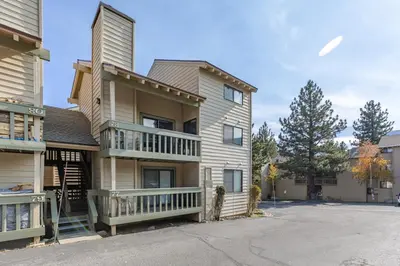a large apartment building with a balcony at La Vista Blanc 78 in Mammoth Lakes