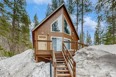 a tiny house on a pile of snow at Poma Lane in Soda Springs