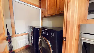 a washer and dryer in a tiny house at Val DIsere #10 condo in Mammoth Lakes