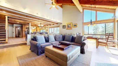 a living room with a couch and a table at Val DIsere #10 condo in Mammoth Lakes
