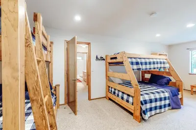 a bedroom with a bunk bed and a bunk ladder at Summer Creek in Groveland