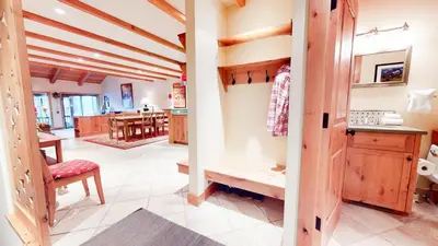 a kitchen and living room with wooden ceilings at Val D'Isere #9 condo in Mammoth Lakes
